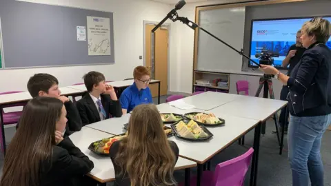 Riley interviewing pupils at Haverfordwest High