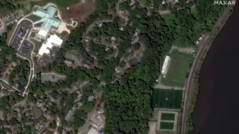 Maxar Technologies Satellite image of athletic fields near the Hudson River before the storm