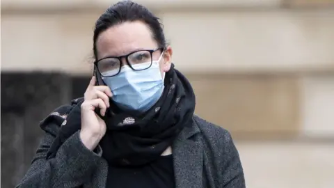 PA Media Natalie McGarry arrives at court for sentencing for her embezzlement conviction