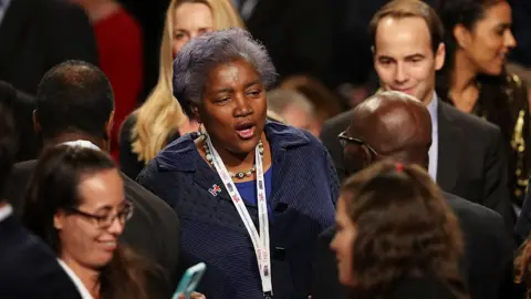 Getty Images Former DNC Chair Donna Brazile arrives before the start of the third US presidential debate in Las Vegas, Nevada.