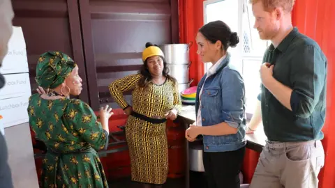 Getty Images Meghan and Harry visit the Waves for Change