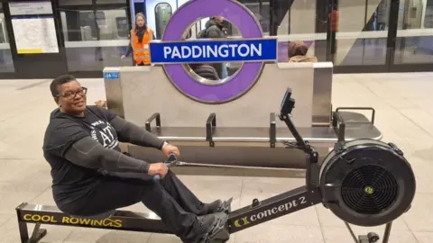 Comic Relief A participant rows at Paddington station
