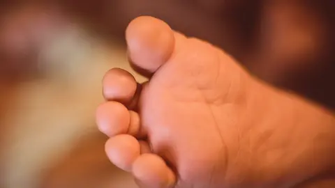 Getty Images Stock photo of a baby's foot