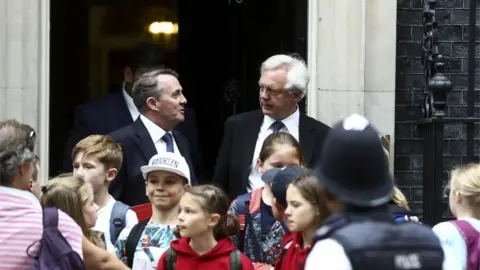 Getty Images Liam Fox and David Davis outside 10 Downing Street