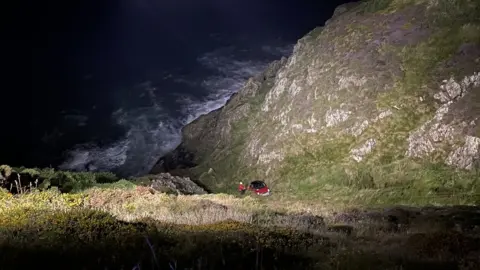 Isle of Man Fire and Rescue Service Car at bottom of cliff