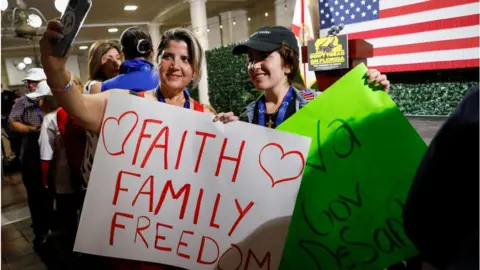 Getty Images DeSantis supporters take a selfie