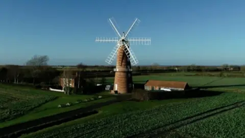 A windmill in a field