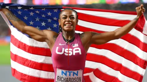 Sha'Carri Richardson celebrates world 100m gold