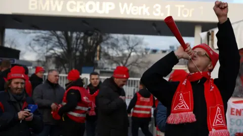 Reuters BMW workers during a 24-hour strike by German industrial trade union IG Metall in Berlin