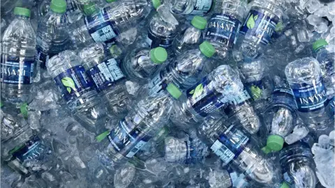 Getty Images Plastic bottles of Dasani water