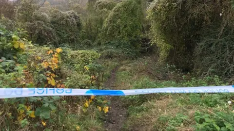 BBC Police cordon at woodland