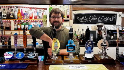 Harry Linder Harry Linden behind the bar