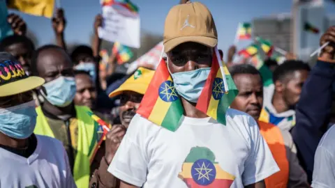 Getty Images A marcher sporting the Ethiopian flag