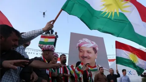 AFP Iraqi Kurds rally in Irbil, with poster of Massoud Barzani (13/09/17)