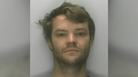 Gloucestershire Constabulary A police mugshot of Paul Irving