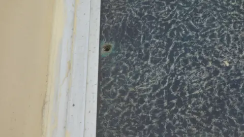 Bullet holes on St Peter's Lutheran Church in Monrovia