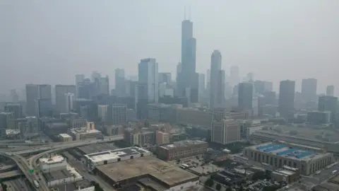 Reuters Haze caused by wildfires in Canada hangs over Chicago, Illinois, U.S., June 27, 2023.