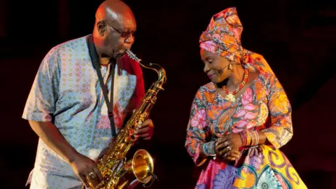 Getty Images Manu Dibango with Angelique Kidjo