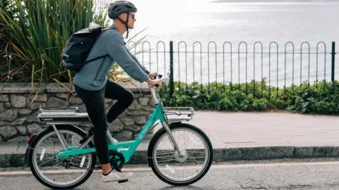 Beryl Man riding a Beryl e-bike
