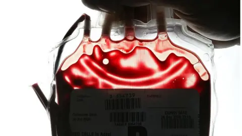 Getty Images Bag of donated blood being held
