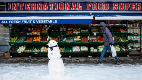 Jack Taylor/Getty Fruit and veg shop in London