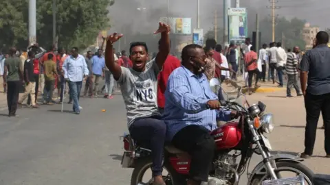 Supplied People protest near the army HQ in Khartoum