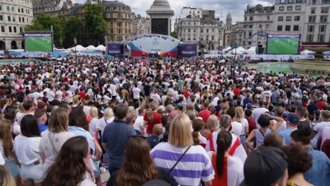 EPA Fans celebrate England's historic win