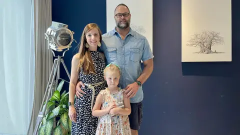 Aretha Pretorius Aretha and Chris Pretorius and their daughter Bella