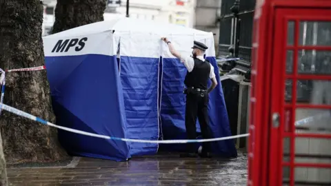 PA Media A police tent outside the British Museum in London