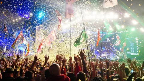 Elton John performing on the Pyramid Stage at the Glastonbury Festival at Worthy Farm in Somerset.