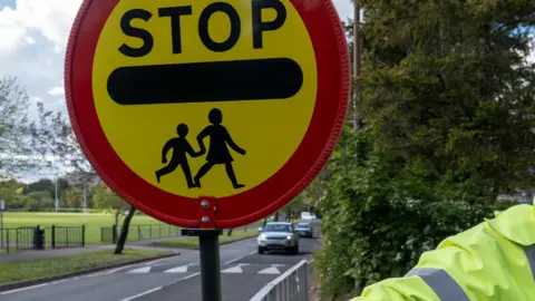 Getty Images lollipop crossing sign