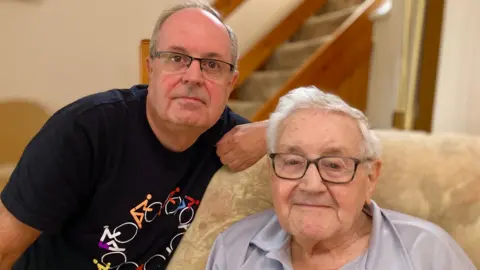 Martin Giles/BBC Derek and Colin Garrett