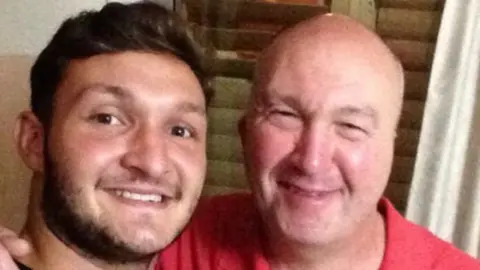 family handout George Low with his father Martyn