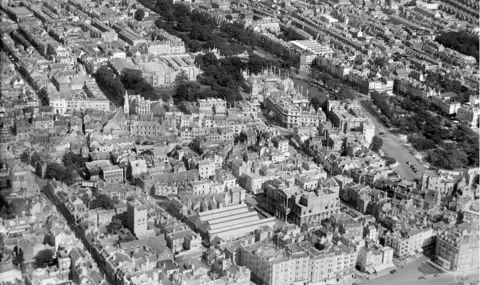 Historic England Archive / Aerofilms Collection An aerial view of The Royal Pavilion and surrounding streets, Brighton, taken in August 1926