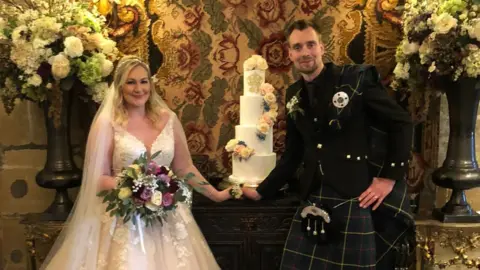 Family handout Stacey and Joost on their wedding day in March 2022