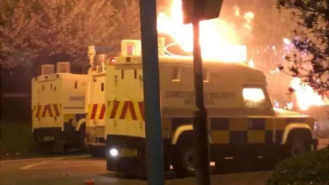 Police Land Rover on fire in Newtownabbey on 3 April