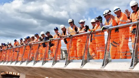 Network Rail Workers at the finished sea wall site