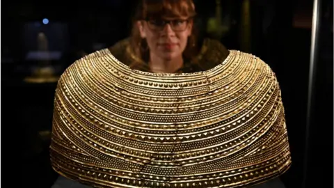 Getty Images Mold Gold Cape