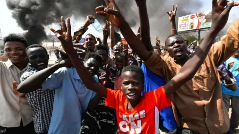 AFP via Getty Images Protesters on the streets in Sudan