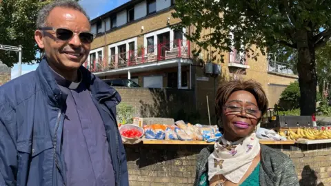 BBC Father Tesfamichael Negusse and Henrietta Onyema