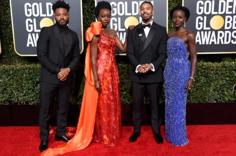 Frazer Harrison Black Panther director Ryan Coogler with actors Danai Gurira, Michael B Jordan, and Lupita Nyong'o