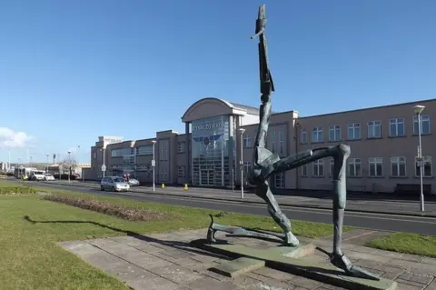 Richard Hoare/Geograph Bryan Kneale's Three Legs of Man at Ronaldsway Airport