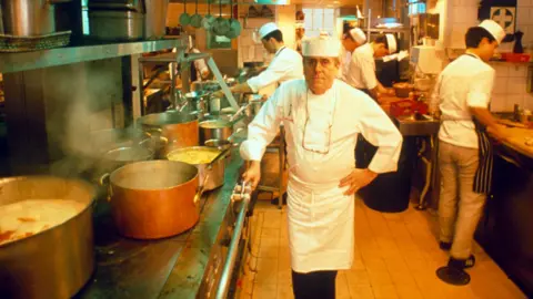 Shutterstock Albert Roux in the kitchen of Le Gavroche in 1989