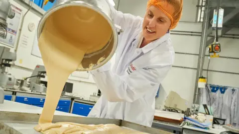 PA Media Frances Quinn with Jaffa Cake mixture