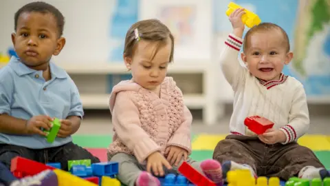 Getty Images Children playing with toys