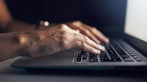 Getty Images Person using laptop