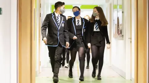 PA Media Pupils in masks