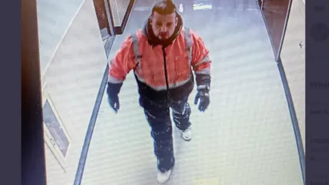 Cheektowaga Police Jay Withey on surveillance camera at the school where he and others sought shelter during the winter storm