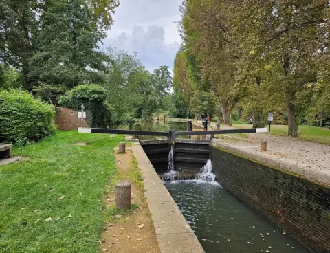 Dylan Thomas A lock with water flowing though it