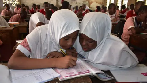 AFP Muslim schoolgirls in hijabs at a class in Mombasa, Kenya
